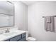 Bathroom with modern vanity and shower with white tile at 10249 Villa Palazzo Ct, Tampa, FL 33615