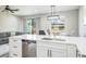 Modern kitchen featuring white cabinets, stainless steel appliances and a kitchen island at 10249 Villa Palazzo Ct, Tampa, FL 33615