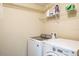 Laundry room with modern washer and dryer at 10249 Villa Palazzo Ct, Tampa, FL 33615