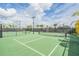 Well-maintained tennis courts with lush landscaping, offering residents an active lifestyle at 10389 Echo Dock Loop, San Antonio, FL 33576