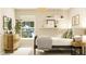 Bright bedroom featuring a rod-iron bed frame, neutral color palette, wall decor, and plenty of natural light at 106 Lilyan Ct, Rotonda West, FL 33947