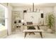 Bright office space featuring a wooden desk, modern light fixture, and stylish built-in bookshelves at 106 Lilyan Ct, Rotonda West, FL 33947