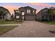 Beautiful two-story home with a spacious driveway and a well-maintained lawn at 10845 Sundrift Dr, Tampa, FL 33647