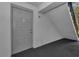 Unit entrance door featuring a secure lock and the unit number B1 at 1182 Pine Ridge W Cir # B1, Tarpon Springs, FL 34688