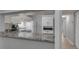 Kitchen featuring granite countertops, white cabinetry, and modern appliances at 1182 Pine Ridge W Cir # B1, Tarpon Springs, FL 34688