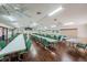 Large meeting room featuring plenty of tables and chairs at 1182 Pine Ridge W Cir # B1, Tarpon Springs, FL 34688