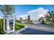 A gated entrance to the community ensures privacy and security for its residents with lush landscaping at 11965 Cinnamon Fern Dr, Riverview, FL 33579