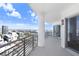 Balcony with railings, concrete floors, and stunning city views, perfect for outdoor living and relaxation at 1209 E Cumberland Ave # 1703, Tampa, FL 33602