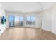 Living room featuring gorgeous floors, big windows, and city views at 1209 E Cumberland Ave # 1703, Tampa, FL 33602