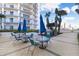 Community patio with seating, grill, and city view, perfect for outdoor relaxation and entertainment at 1209 E Cumberland Ave # 1703, Tampa, FL 33602