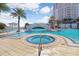 Resort-style pool with jacuzzi and a bridge, perfect for relaxation and recreation in a beautiful setting at 1209 E Cumberland Ave # 1703, Tampa, FL 33602