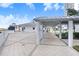 Inviting rooftop deck featuring a covered walkway with decorative columns and spacious area for entertaining and relaxing at 1209 E Cumberland Ave # 1703, Tampa, FL 33602