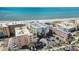 Scenic aerial view of beachfront property and pristine sands at 12924 Gulf Blvd # 110, St Petersburg, FL 33708