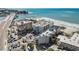 Aerial shot of the property, showcasing its proximity to both the beach and the bay at 12924 Gulf Blvd # 110, St Petersburg, FL 33708