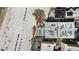Aerial shot of property with oceanfront pool, umbrellas, lounge chairs, and beachfront at 12924 Gulf Blvd # 110, St Petersburg, FL 33708