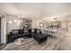 Comfortable living room with stylish furniture, artwork, and an open layout to the dining and kitchen areas at 12924 Gulf Blvd # 110, St Petersburg, FL 33708