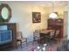 Cozy dining area featuring a classic table set and wooden furnishings at 1345 Drew St # 5, Clearwater, FL 33755
