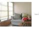 A cozy living area bathed in natural light with a comfortable sofa at 1345 Drew St # 5, Clearwater, FL 33755