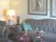 Comfortable living room area with a plush sofa and decorative accents at 1345 Drew St # 5, Clearwater, FL 33755