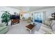 Inviting living room with comfortable seating and lots of light, perfect for relaxing at 19 Drury Ln, Tarpon Springs, FL 34689