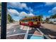 View of a tourist trolley car in Tarpon Springs, Florida, with blue sky at 19 Drury Ln, Tarpon Springs, FL 34689