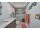 Updated bathroom with a stand-up glass shower, updated vanity and neutral modern decor at 2650 Countryside Blvd # F209, Clearwater, FL 33761