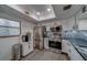 Modern kitchen boasts stainless steel appliances, stylish backsplash, and ample counter space at 2650 Countryside Blvd # F209, Clearwater, FL 33761
