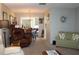Spacious living room flows into the dining area, providing ample natural light at 3710 98Th N Ave, Pinellas Park, FL 33782