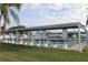 Outdoor shuffleboard courts featuring shaded seating and well maintained green areas at 3710 98Th N Ave, Pinellas Park, FL 33782