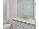 Bathroom featuring a vanity, toilet, and white walls at 37252 Clinch Cir, Zephyrhills, FL 33540