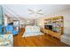 Spacious living area features a bamboo entertainment center and views of the kitchen at 4450 Gulf Blvd # 303, St Pete Beach, FL 33706