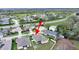 Residential neighborhood featuring well-maintained lawns, mature trees, and community road access at 4644 Braesgate Ct, Land O Lakes, FL 34639