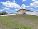 Backyard featuring a well maintained lawn and privacy fence at 4644 Braesgate Ct, Land O Lakes, FL 34639