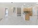 Bright kitchen featuring granite counters, stainless steel appliances, and an adjacent dining area at 4644 Braesgate Ct, Land O Lakes, FL 34639