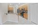 Charming kitchen with granite counters, stainless steel appliances, and tile floors at 4644 Braesgate Ct, Land O Lakes, FL 34639