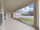 Screened in porch overlooking the backyard at 4644 Braesgate Ct, Land O Lakes, FL 34639