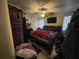 Standard bedroom with a ceiling fan and natural light from the windows at 5034 Terrace Village Ln, Tampa, FL 33617