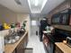 Functional kitchen with black appliances and ample cabinet space at 5034 Terrace Village Ln, Tampa, FL 33617