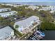 An aerial view of waterfront condos with private docks and balconies near the intercoastal at 5075 Starfish Se Dr # B, St Petersburg, FL 33705