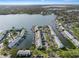 Breathtaking aerial view of waterfront townhomes with private boat docks and stunning bay access at 5075 Starfish Se Dr # B, St Petersburg, FL 33705