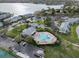 Birds eye view of pool and outdoor lounge. Lush landscaping gives privacy and an upscale feel at 5075 Starfish Se Dr # B, St Petersburg, FL 33705