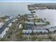 Discover waterfront condo community with boat docks, ample parking, water views, and lush landscaping at 5075 Starfish Se Dr # B, St Petersburg, FL 33705