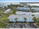Aerial view highlighting the waterfront condos with parking, landscaping, and community amenities at 5075 Starfish Se Dr # B, St Petersburg, FL 33705