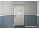 A secure front door featuring neutral paint tones and decorative molding, offering a secure and welcoming entry at 5075 Starfish Se Dr # B, St Petersburg, FL 33705