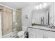 Bathroom features a glass-enclosed shower, modern vanity, and stylish fixtures, providing a spa-like experience at 5089 Royal Palms Way # 202, New Port Richey, FL 34652