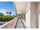 Spacious covered balcony with views of lush greenery and the surrounding tropical landscape at 5240 Westshore Dr, New Port Richey, FL 34652