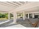 Waterfront home with covered lower level space and views of fenced in yard at 5240 Westshore Dr, New Port Richey, FL 34652