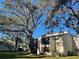 Condo exterior featuring green lawn at 700 Starkey Rd # 1525, Largo, FL 33771