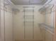 Walk-in closet featuring custom shelves and rods for optimal organization at 700 Starkey Rd # 1525, Largo, FL 33771