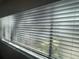 Bright window with blinds overlooking outdoor view at 700 Starkey Rd # 1525, Largo, FL 33771